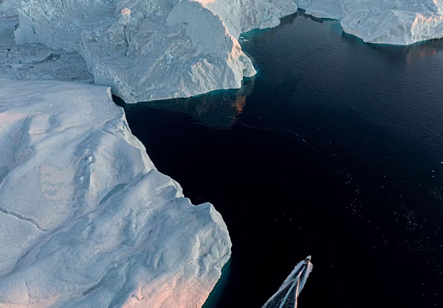 Climate Change in the Arctic Threatens Greenland Fishing Industry as Melting Sea Ice Forces Traditional Fishers toward Boat Fishing