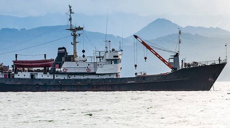Cargo ship at a Kenyan port highlighting maritime safety regulations and port operations.