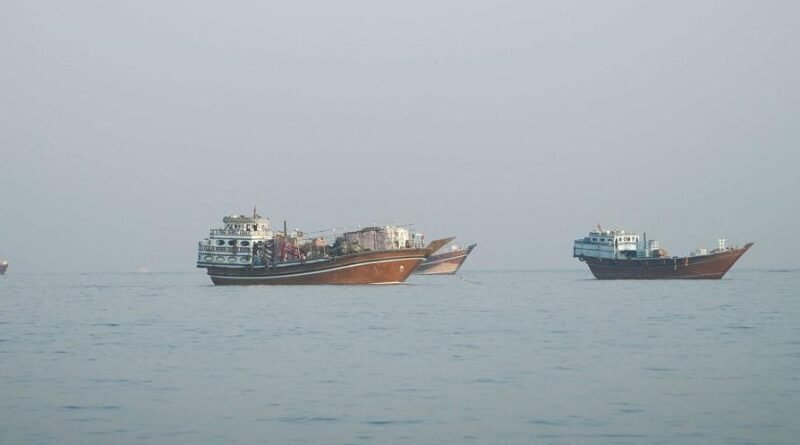 Oil tankers navigating the Strait of Hormuz amid maritime security threats and reported naval mines
